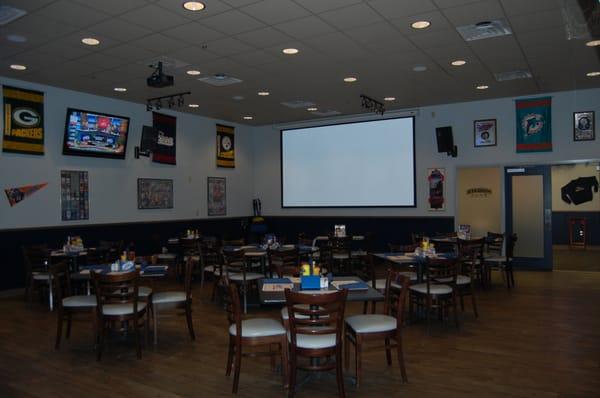 Main dining room with large projection TV