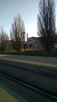 Grounds featuring a few trees in front of the Bighorn Exchange restaurant