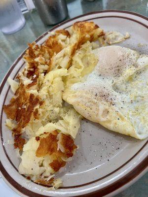 Hashbrowns and over easy eggs