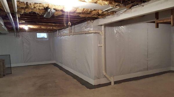 Full Perimeter Basement Waterproofing system with a full wall liner.