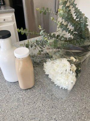 Coconut milk, Keto coffee, and flowers with eucalyptus