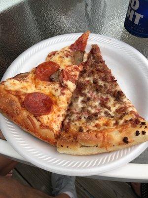 Delicious Sausage and Pepperoni next to a Bacon and Hamburger pizza