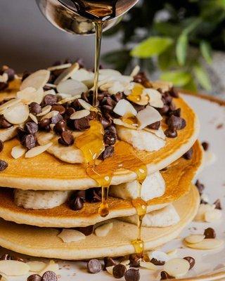 Chocolate Chip Pancakes, with Banana, Almonds & Maple Syrup