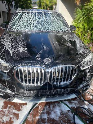 Expert hand wash for this BMW SUV! Our mobile auto detailing service delivers a flawless shine. #MobileCarWash #CarDetailingNearMe