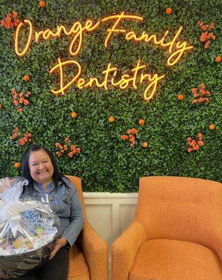 Our happy patient, winner of one of our gift baskets