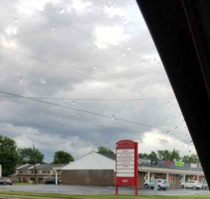 Green Chili Strip Mall location with sign