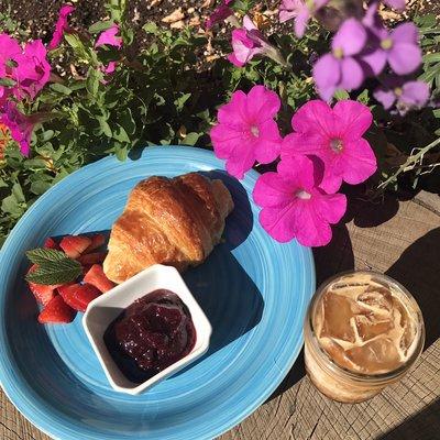 Sit in a beautiful garden and enjoy delicious coffee and pastries