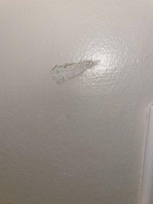 Another scratched wall.