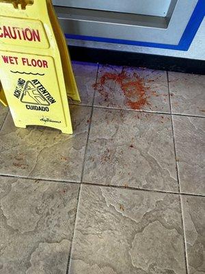 Throw up and blood near the ATM.