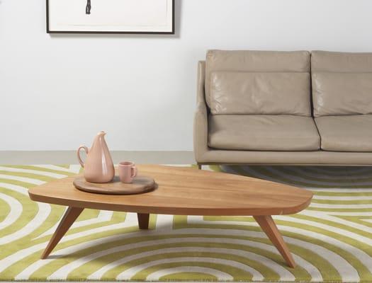 Swell coffee table and Marsden area rug in Citron.