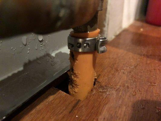 Burst pipe from pex rubbing against the edge of the heater