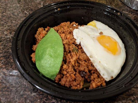 Picadillo a la Habanera entree: beef with olives, peppers, avocado and a sunny up egg.