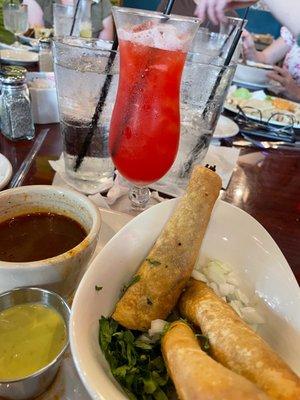 Flautas de Birria and large strawberry margarita