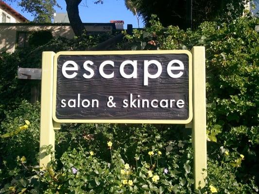 Escape business sign