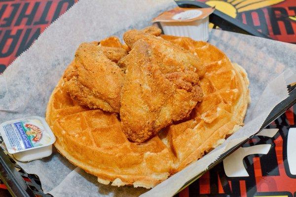 Our "Mania special " 3 southern fried chicken wings and one golden waffle!