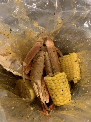 Snow crab, corn, potatoes, butter and lemon in a mild spicy garlic sauce.