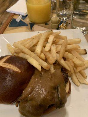 Pulled pork sandwich on French roll and French fries