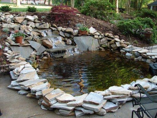 Gorgeous koi pond built for rest & relaxation.