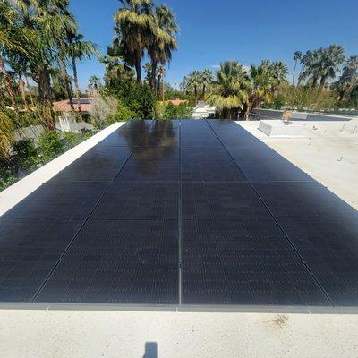 Rooftop solar on flat foam roof, In the desert