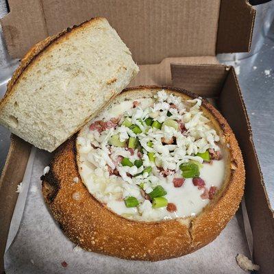 Bread Bowl filled with Creamy Potato Bacon soup