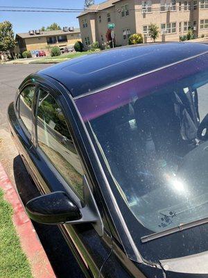 Purple, yes, purple tint. Thanks, Quality Auto Glass.