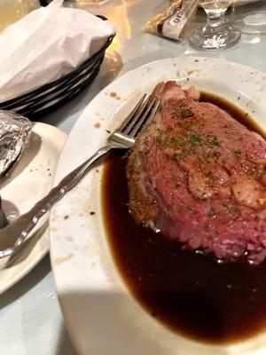 Perfect medium-rare prime rib with excellent seasoning. The baked potatoes were perfectly soft.