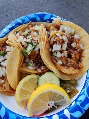 Three Al pastor tacos