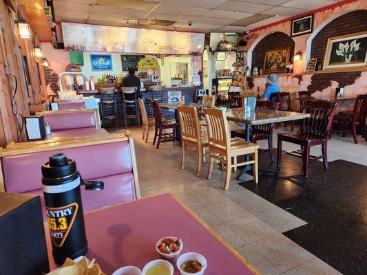 Taqueria side dining area - sweet bread case behind photographer