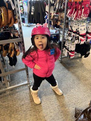 My daughter having a blast shopping at Christy Sports