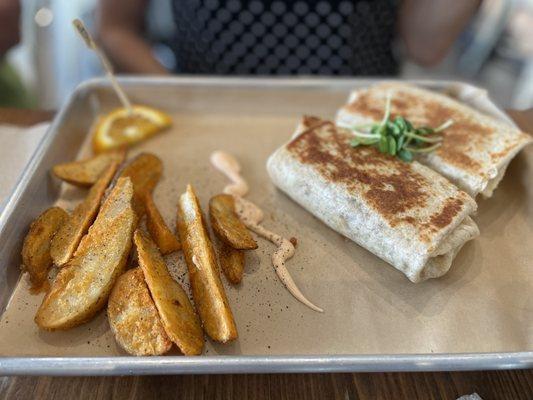 Plant based breakfast burrito and fries