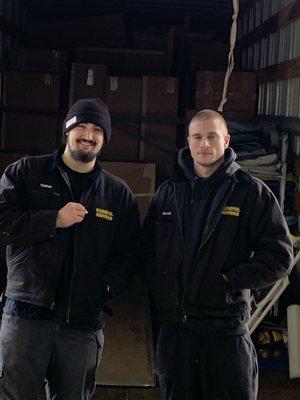 Couple of the crew members in the middle of loading some cabinets for one of our accounts.