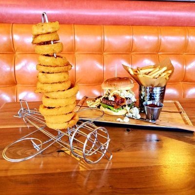 Sky High Onion Rings and Sriracha Burger- Maple Smoked Bacon, Sriracha Aioli, Bibb Lettuce, Tomato, Crumbled Bleu Cheese, Fried Jalapenos