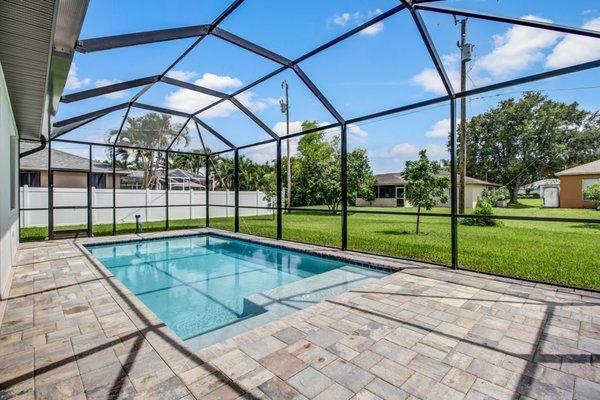 Signature Level Pool - 12x24 with a sun deck and bubbler.