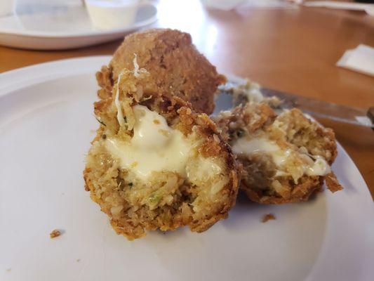 Cheesy filling in the boudin balls- so good.