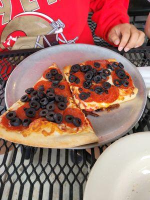 Pepperoni and black olive pizza