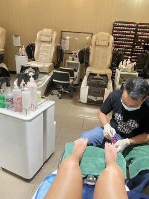 Pedicure, in massage chair, post massage and paraffin wax.