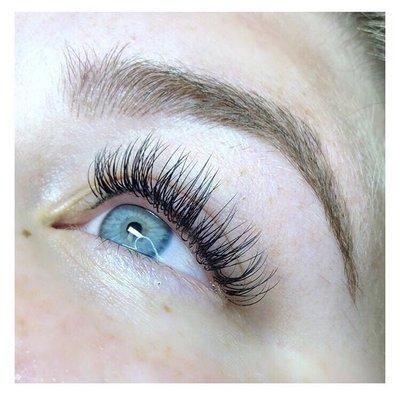 Eyelash enhancement with classic lash extensions