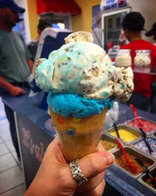 Candy bar and cookie monster ice cream in an m&m cone