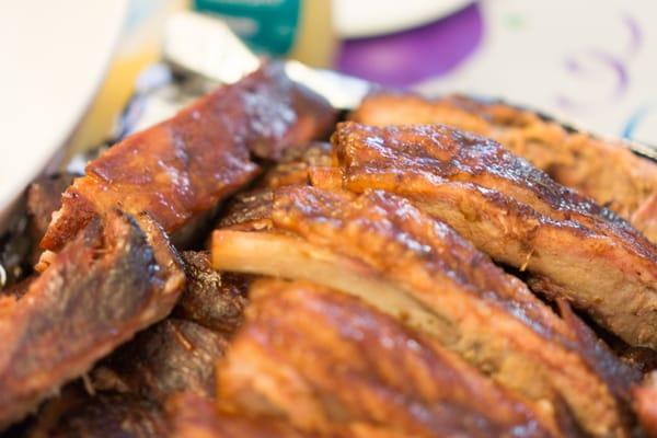 The spareribs I smoked up from Park Packing on the right were fatty fatty. Wal-Mart's came out beautifully on the left.