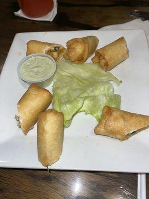 Chicken egg rolls with avocado ranch dipping sauce