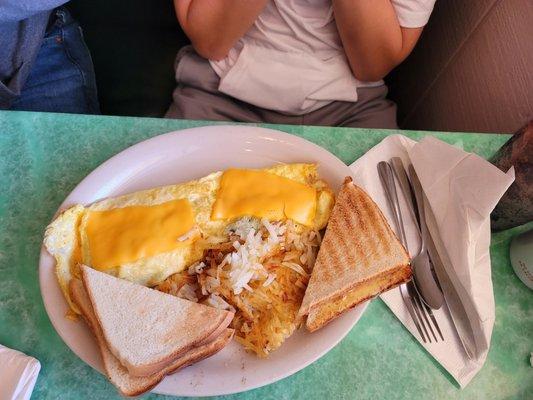 Chorizo omelet with hash browns and white toast