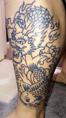 Blue ink, dragon and koi fish done by Ricky. Solid work