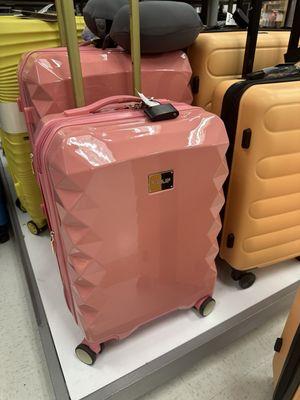 Luggage in a pretty coral color