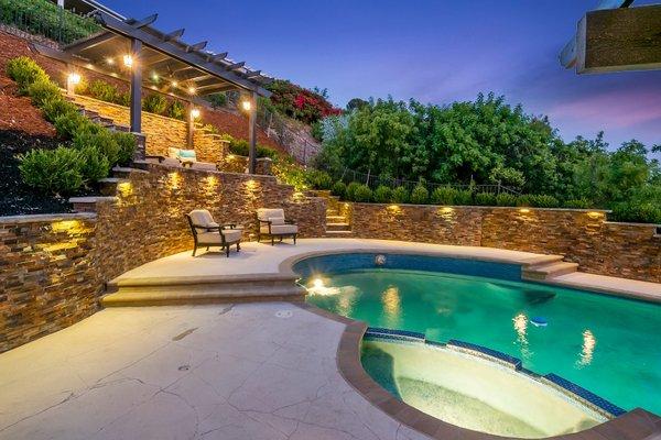 New Retaining wall with amazing European ledge stone. Stairs coming up to a new patio over looking an amazing view over Thousand Oaks.