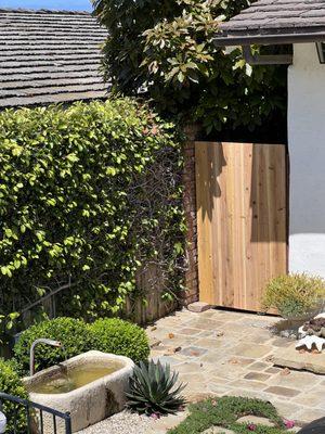 Cedar wood courtyard gate.