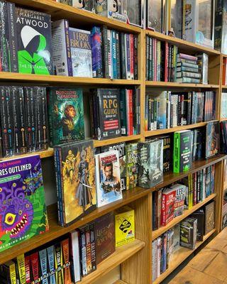 We have a growing selection of new books specializing in sci-fi, fantasy, mystery, horror, RPG, Manga, and graphic novels.