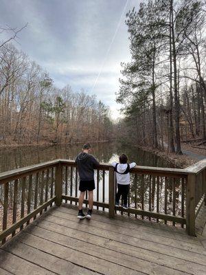 Catch and release pond with a bench swing on each side and port-o-potties available