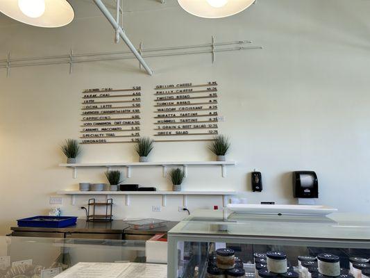 Front counter with drink menu on the wall