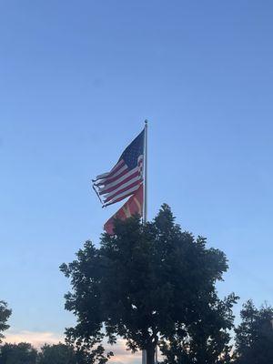 Can you please replace the damaged American Flag outside of your establishment.