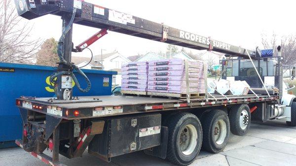 Roofer's Supply truck dropping off the Owens-Corning shingles and Lo-Omni peak vents...